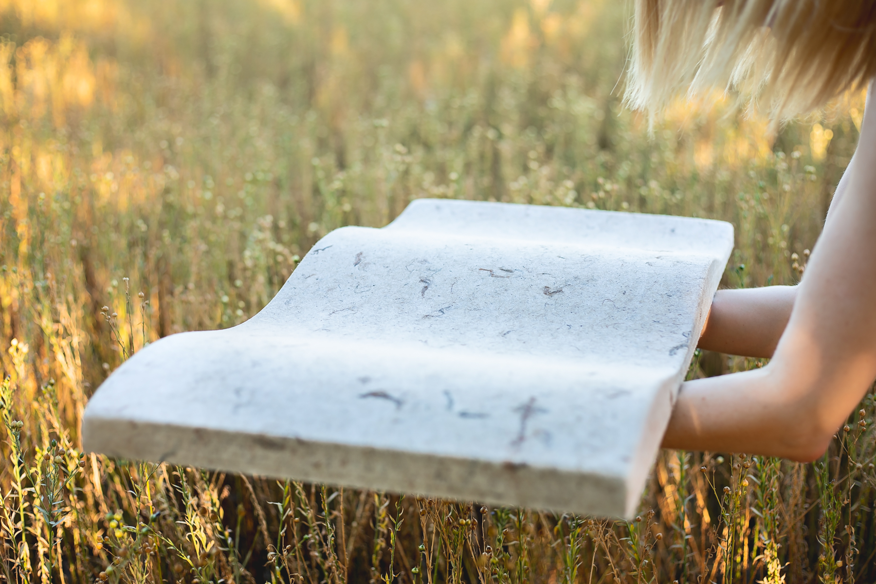 An acoustic panel finished in the VANK_WAVE_BIO_light material made of fibrous plants